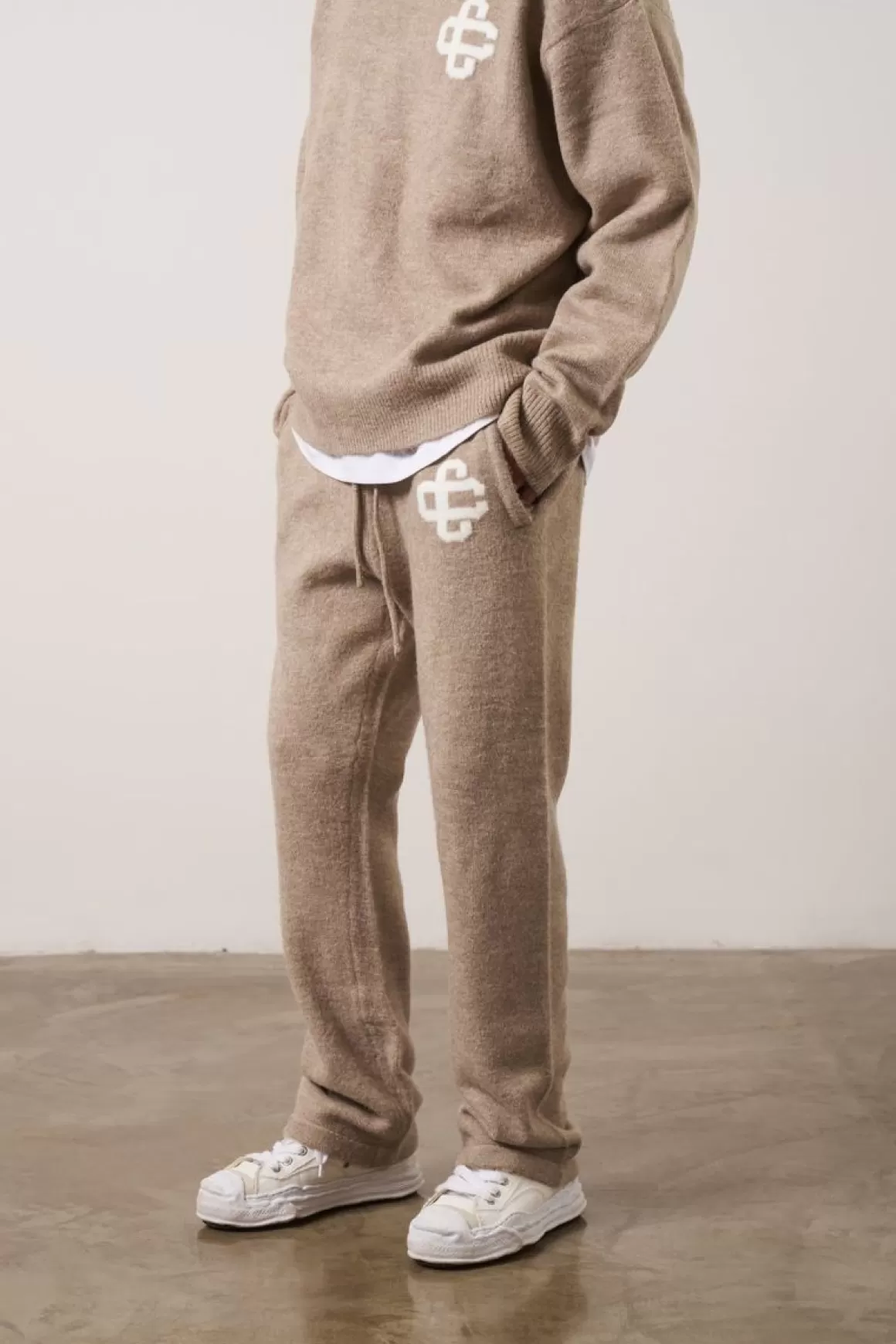 The Couture Club Joggers>Fluffy Knit Emblem Joggers Beige