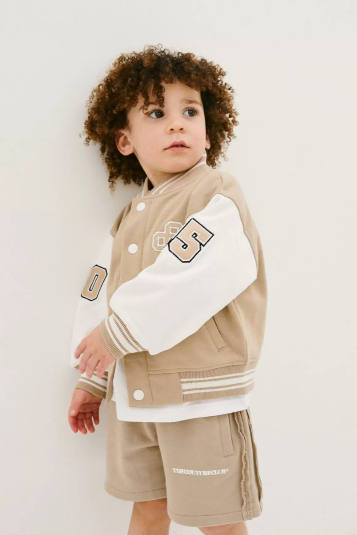 The Couture Club Jackets>Kids Emblem Varsity Bomber Jacket Beige