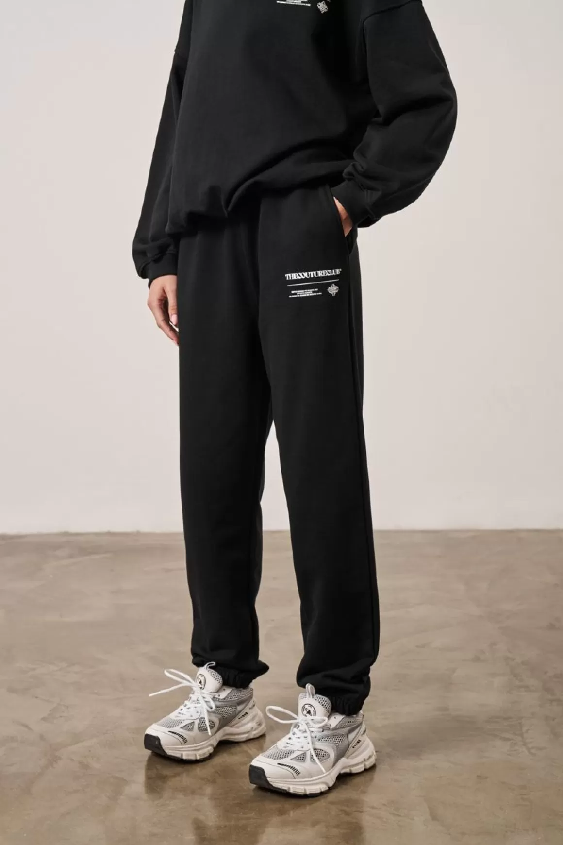 The Couture Club Tracksuits>Multi Graphic Relaxed Joggers Black