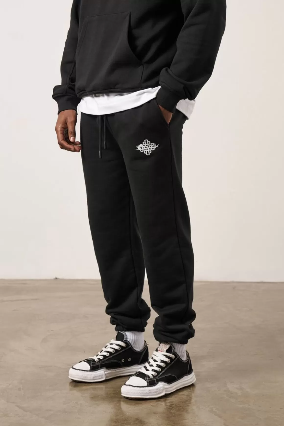 The Couture Club Bottoms>Repeat Emblem Script Cuffed Jogger Black